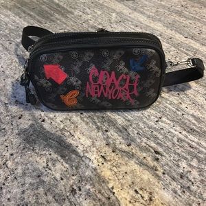 Coach Black and Grey Horse Crossbody with a splash of color.